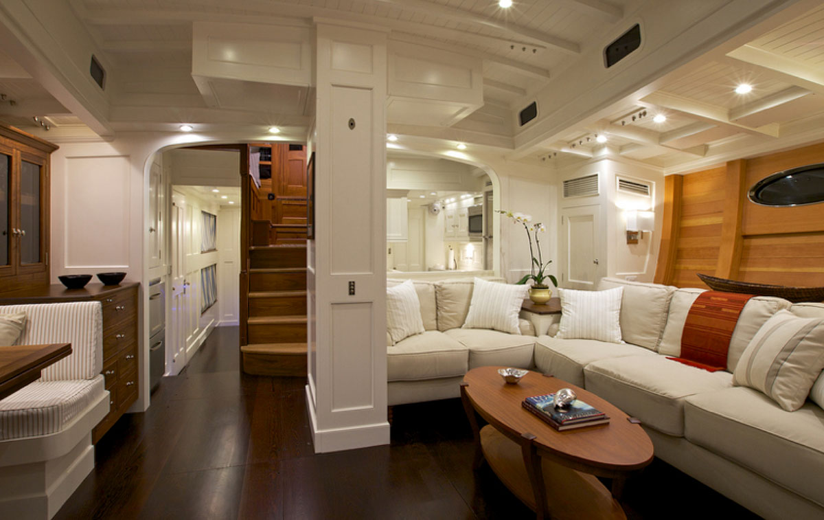 A photo of sailing yacht Bequia's interior. Ornate woodwork and styling.