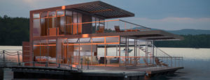A photo of Immerst, a water's edge custom floating home by Stephens Waring Yacht Design